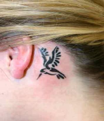 Tribal Hummingbird Pic Tattoo On Back Of Ear